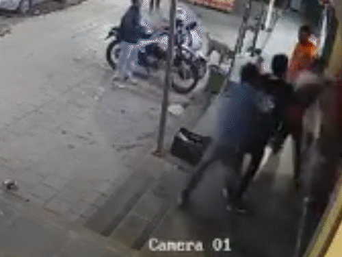 Goons in Chandkheda, CCTV: One youth took off his T-shirt and beat him up, while another was vandalised and set ablaze by shouting racial slurs