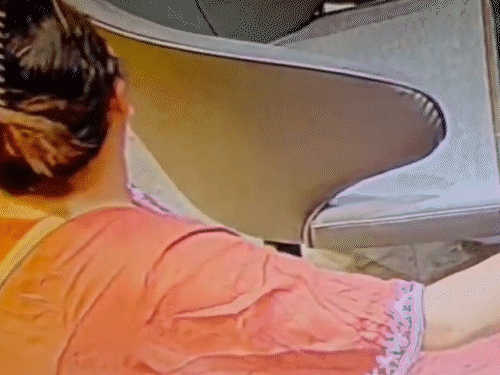 Goggles on her head, tattoos on her hand and Bunny-Thani came to steal, CCTV: Jewellery showroom hides gold earrings in her mouth, falls at her feet after being caught; Vadodara's 'sophisticated thief'