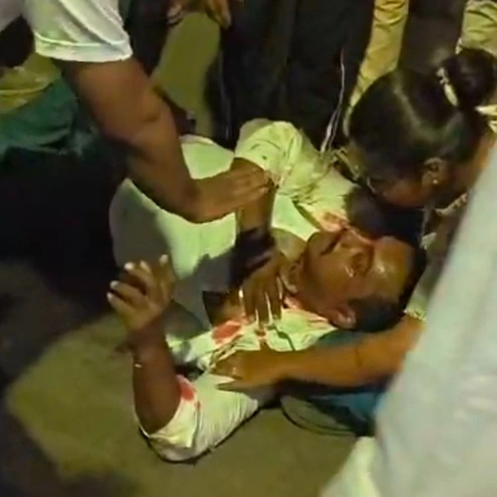 Woman drives reckless car, drags moped driver 20 feet: Trapped people lift car out of the car, woman detained; Siblings hit on way home after dinner in Vadodara
